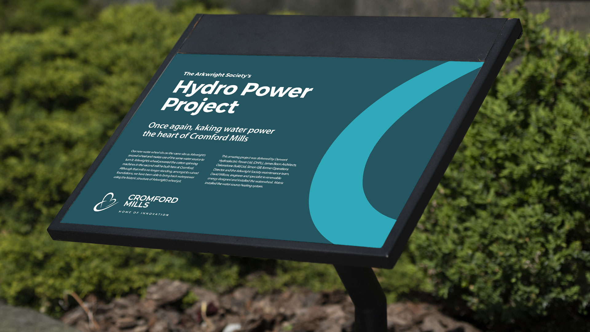 cromford mills info board in garden